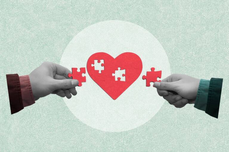 Two,People,Put,Together,A,Heart-shaped,Jigsaw,Puzzle